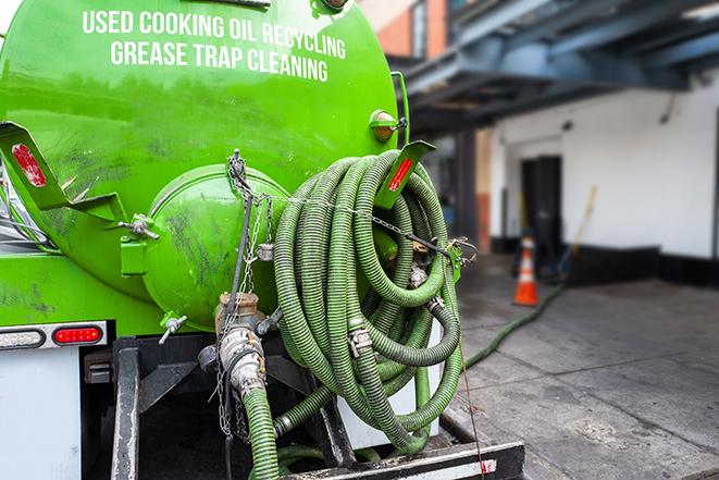 industrial pump clearing a grease trap in Aztec, NM